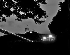 View of Clifton tollhouses lit with crowns for Coronation in 1953